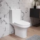 Унитаз-компакт Damixa Skyline DX35C8600SC безободковый, с сиденьем микролифт, белый